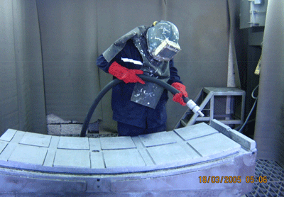 Travaux de prparation de surface dun patin de cimenterie de 6500 mm pour rparation .